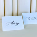 Personalized Calligraphy Wedding Place Cards: Black & White Linen